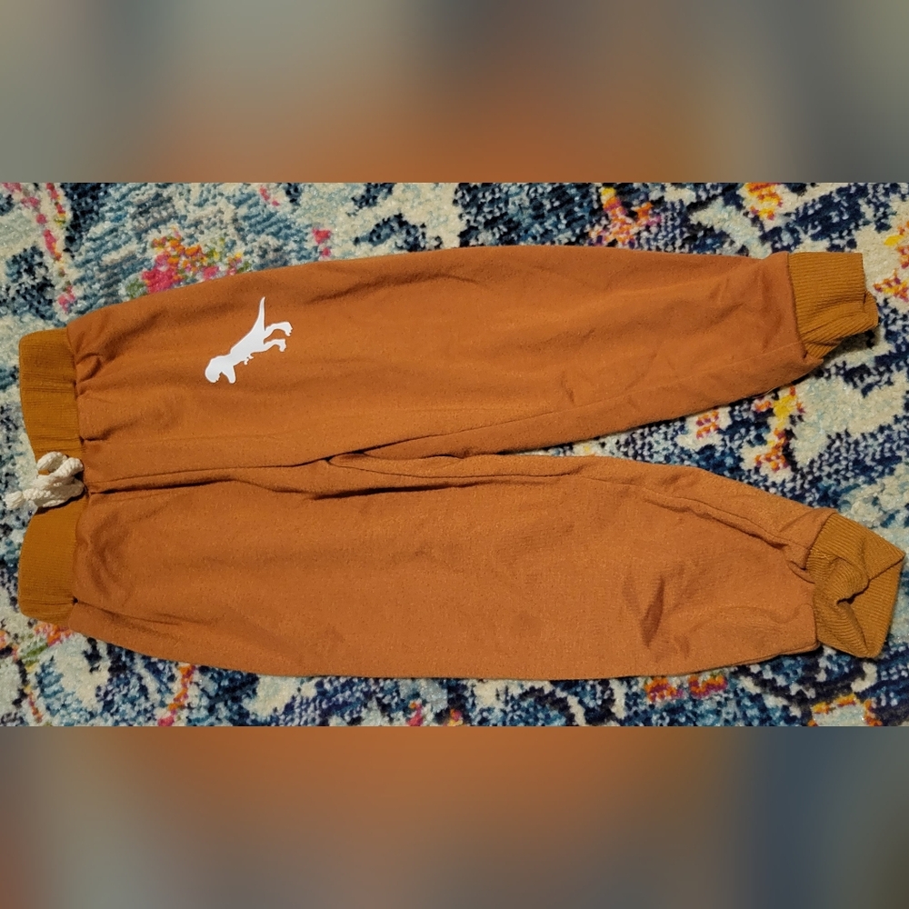 Brown Jogging Pants With White Dinosaur